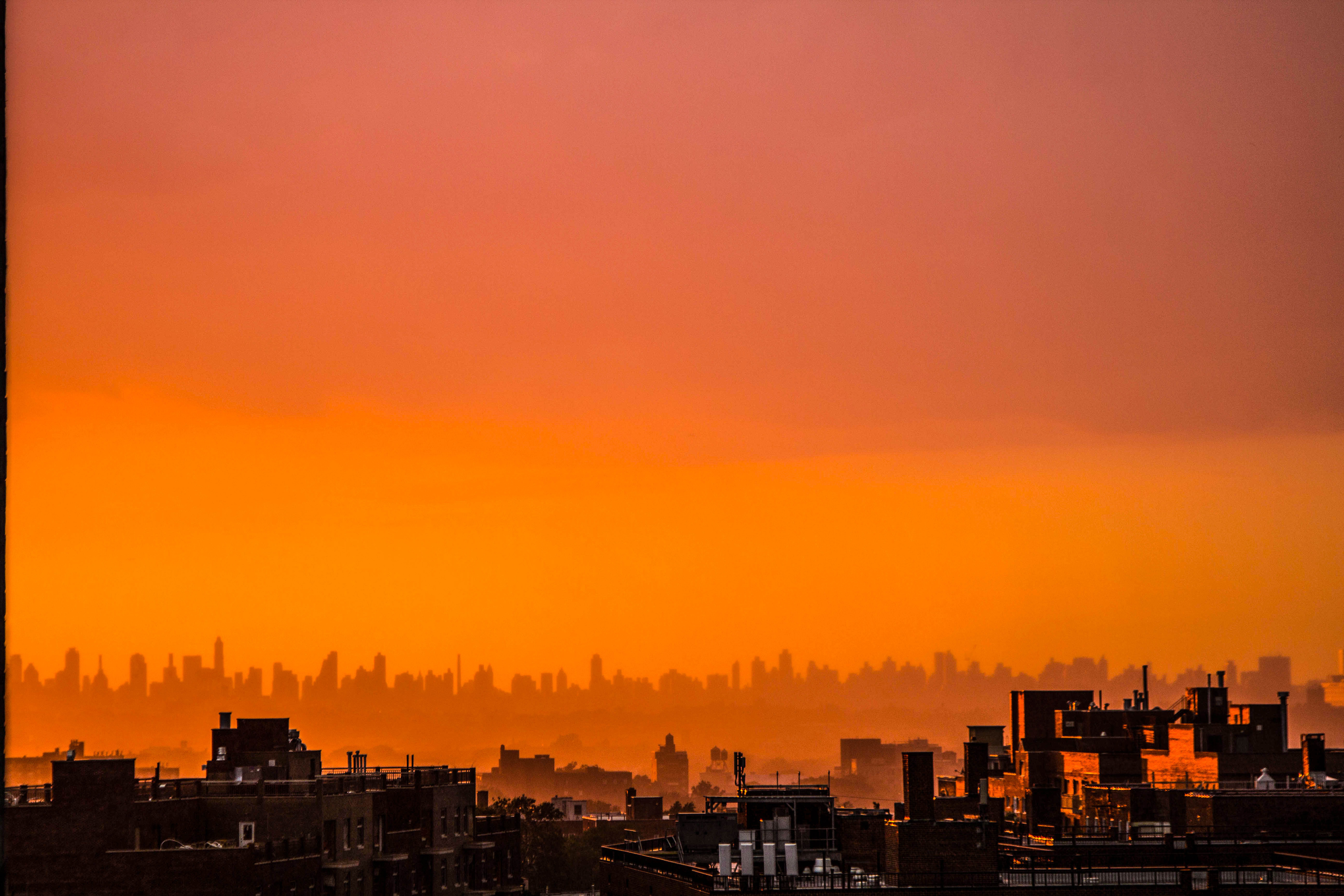 Photography of City During Sunset